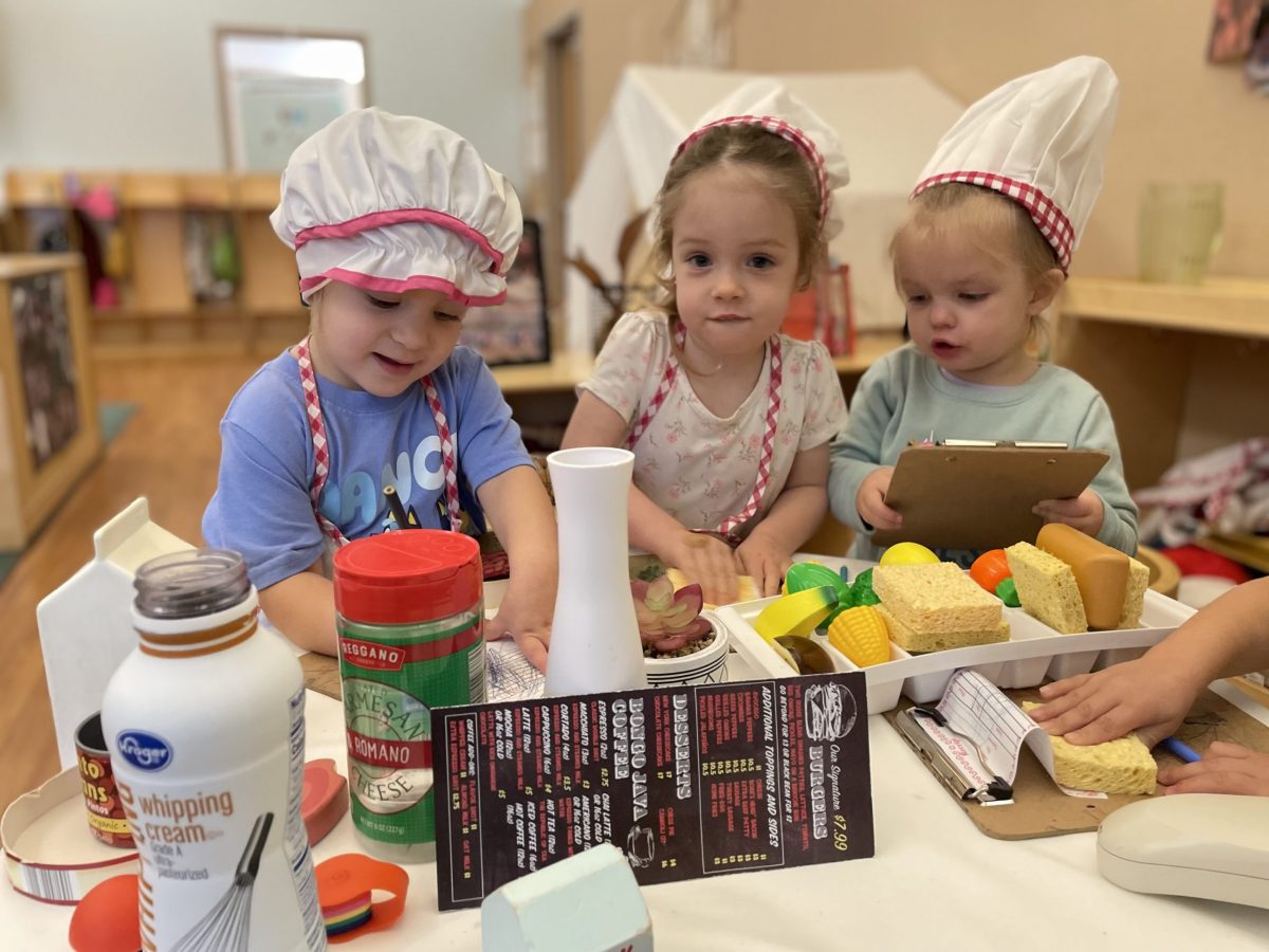 Children of the program in a cooking class