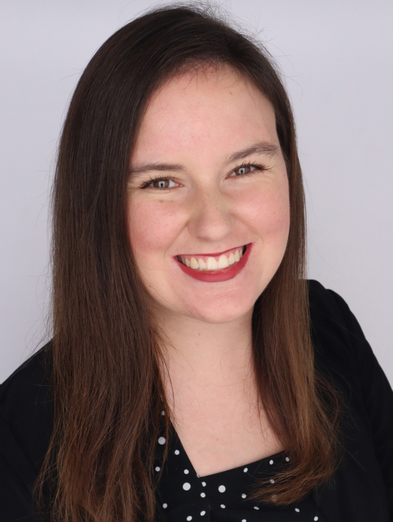 smiling woman with long brown hair