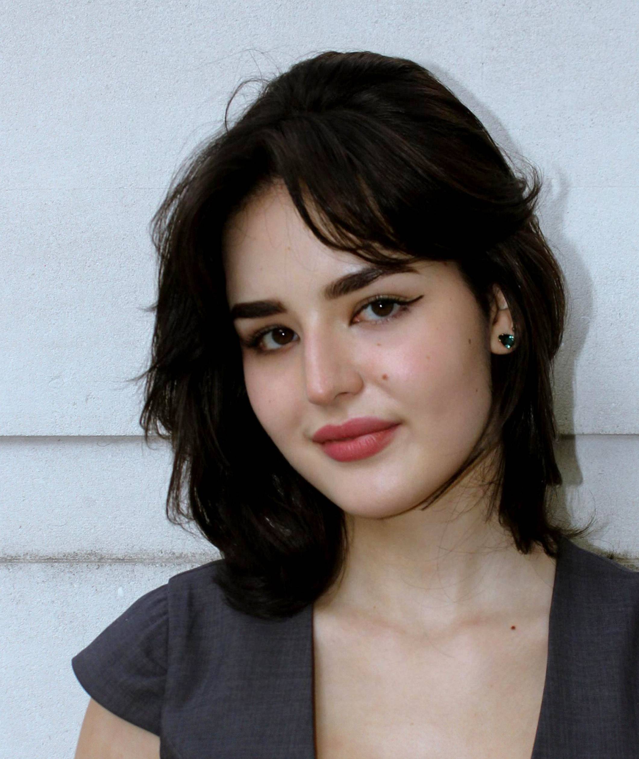 a young woman with dark hair