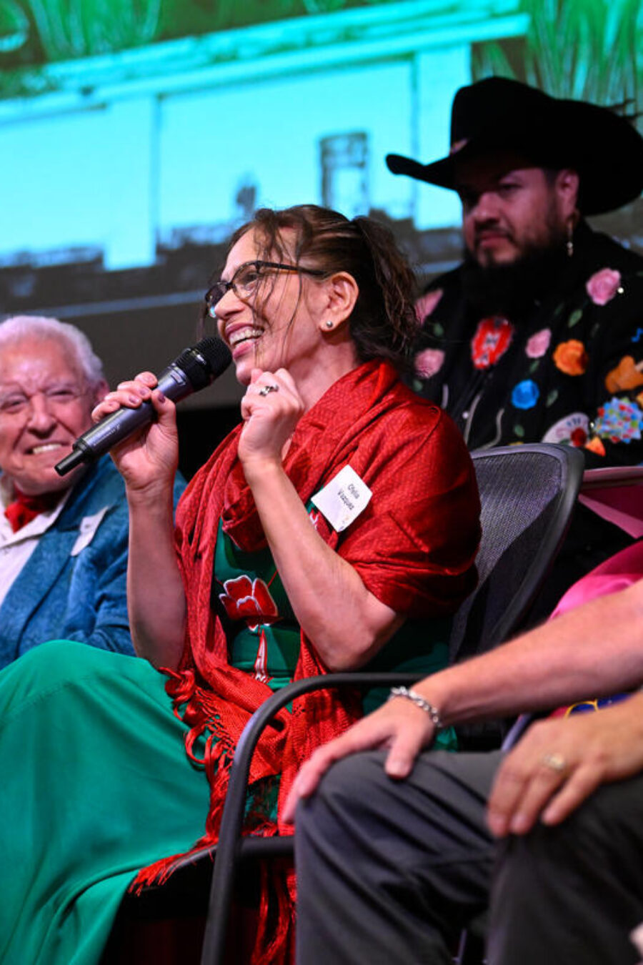 members of Nashville's Latinx/Hispanic community engage in a panel discussion on stage at the Nashville Public Library