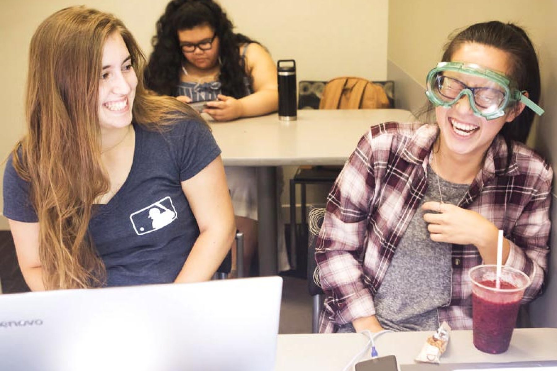 Students sitting at a table together.