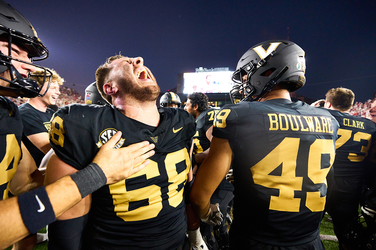 Vanderbilt players, fans and students erupt in celebration after a historic win against Alabama. 